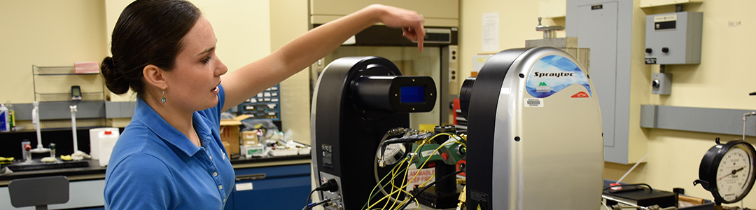 female engineering student conducting research in the lab
