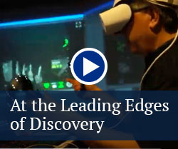 video play button - at the leading edges of discovery
