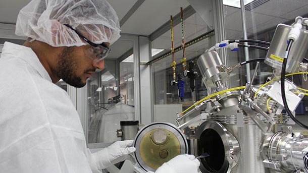 student working in nanotechnology clean room