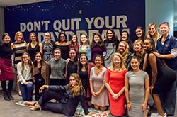 A large group of women posed for a photo.