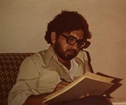 Muhammad Nawaz writes on a notepad when he was a student at Penn State.