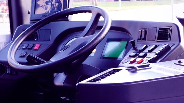steering wheel and control center for a bus