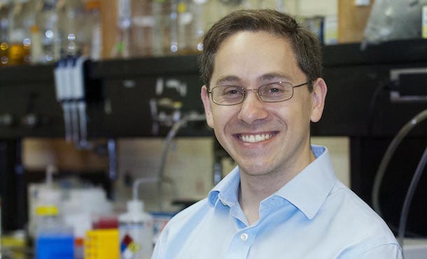 Howard Salis, associate professor of biological engineering and chemical engineering, in synthetic biology laboratory