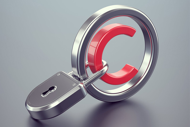 Copyright protection concept. Red copyright symbol with silver padlock