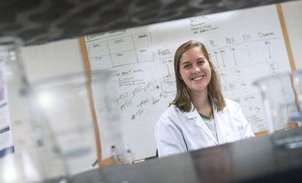 Molly Smallcomb seated in the laboratory